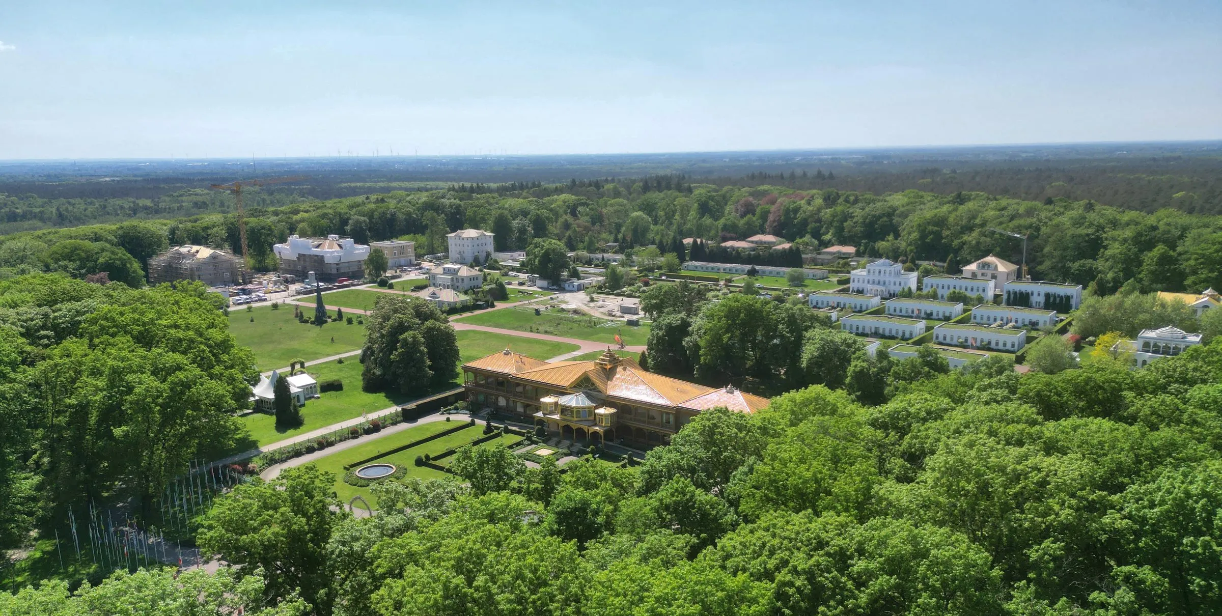 The MERU campus within De Meinweg National Park, buildings small against the trees